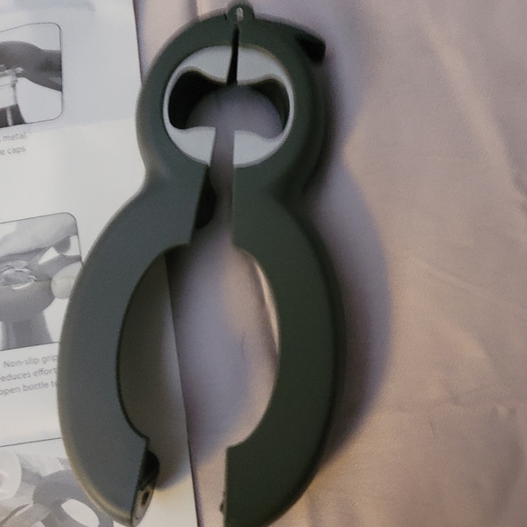MULTI-OPENER- THIS GADGET OPENS SO MUCH! - Picture 3 of 4